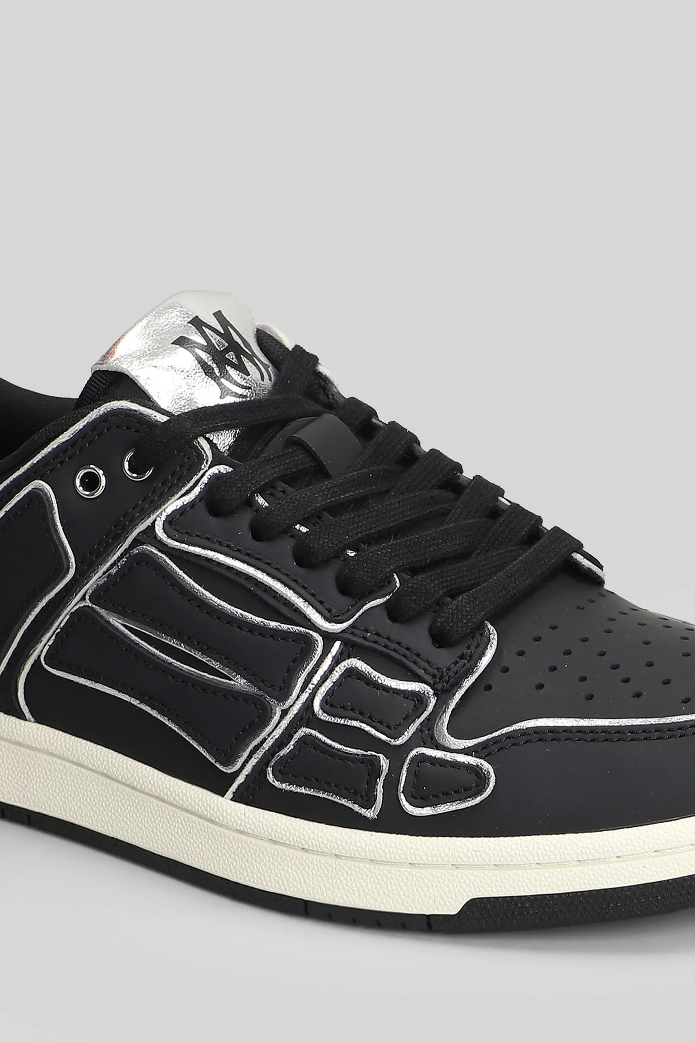 Sapatilhas Amiri Skel low top em couro preto Scarpe